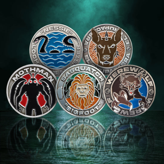 Five challenge coins in two rows, sitting above dark green water in the nighttime sky. Each coin depicts a Cryptid covered by Aaron Mahnke's "Lore" podcast: Nessie, Chupacabra, Sasquatch, Mothman, and Werewolf.