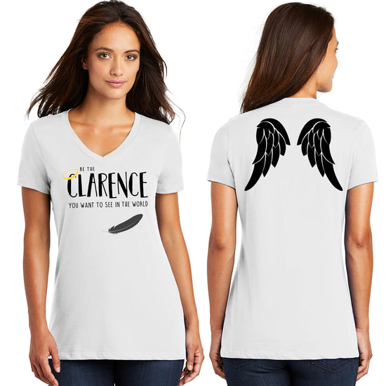 Front and back views of a female model. She's wearing a white v-neck t-shirt that says "Be the Clarence you want to see in the world" with a halo and black feather on the front, and a black angel wing print on the back.