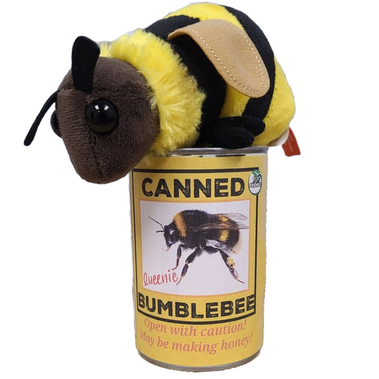 A bumblebee plushie sitting on a yellow can. The front of the can has a picture of a bumblebee, with black and red text that says "canned bumblebee. Open with caution! May be making honey!"