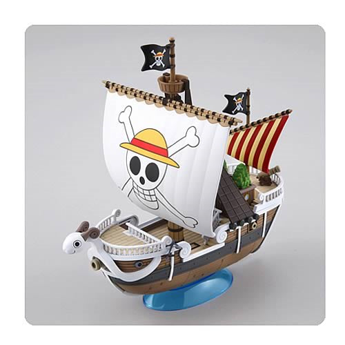 A pirate ship model from the series One Piece with skull and crossbones design on a grey background