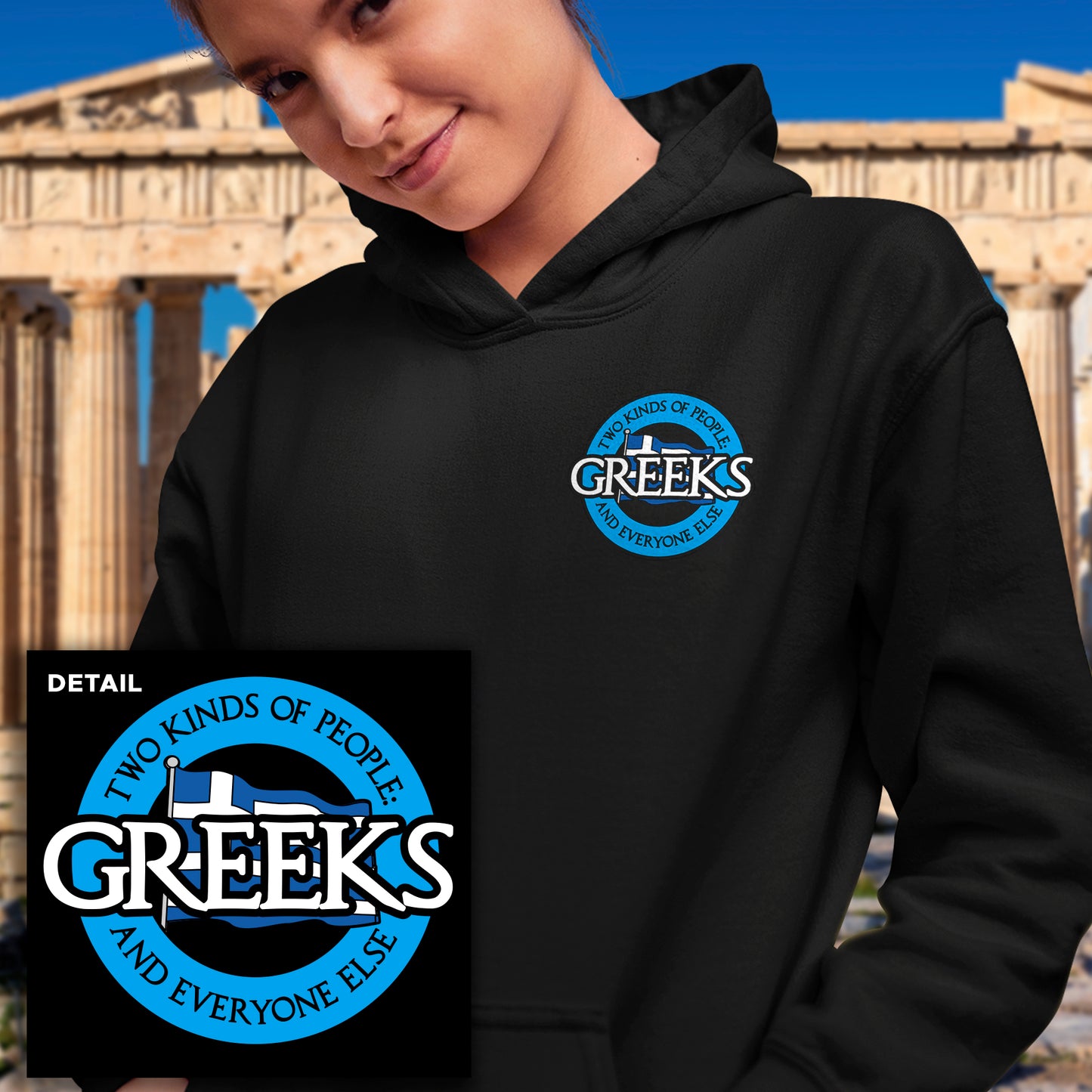 A model in a black hoodie against a Greek backdrop. The hoodie has a blue and white logo on the front left. The logo says "two kinds of people, Greeks and everyone else"