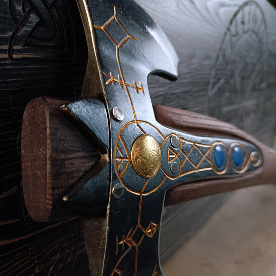 Close up of an axe styled after the one used by Kratos in the "God of War" video games.