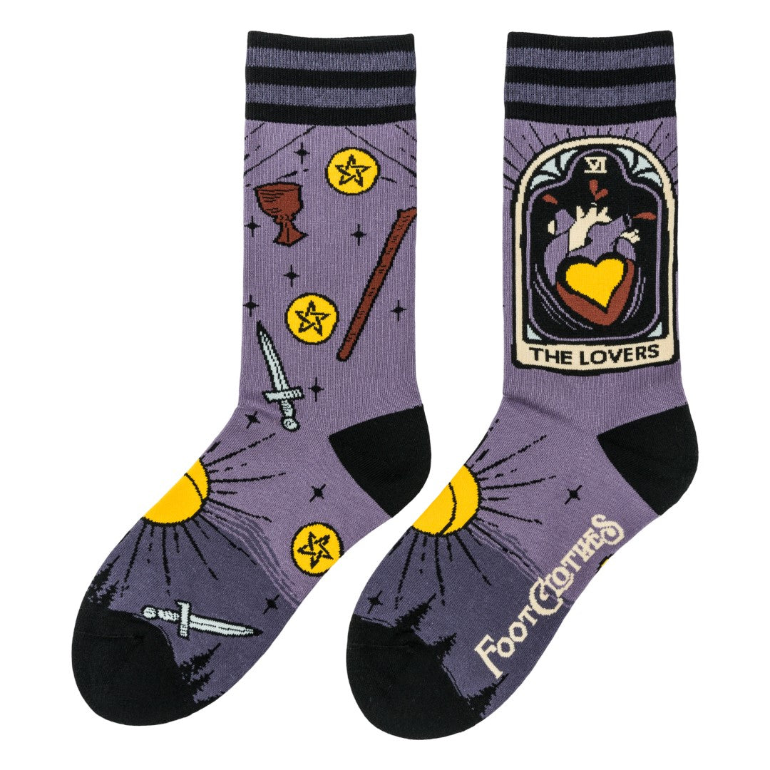 Pair of socks with tarot card design and 'The Lovers' card illustration on a white background