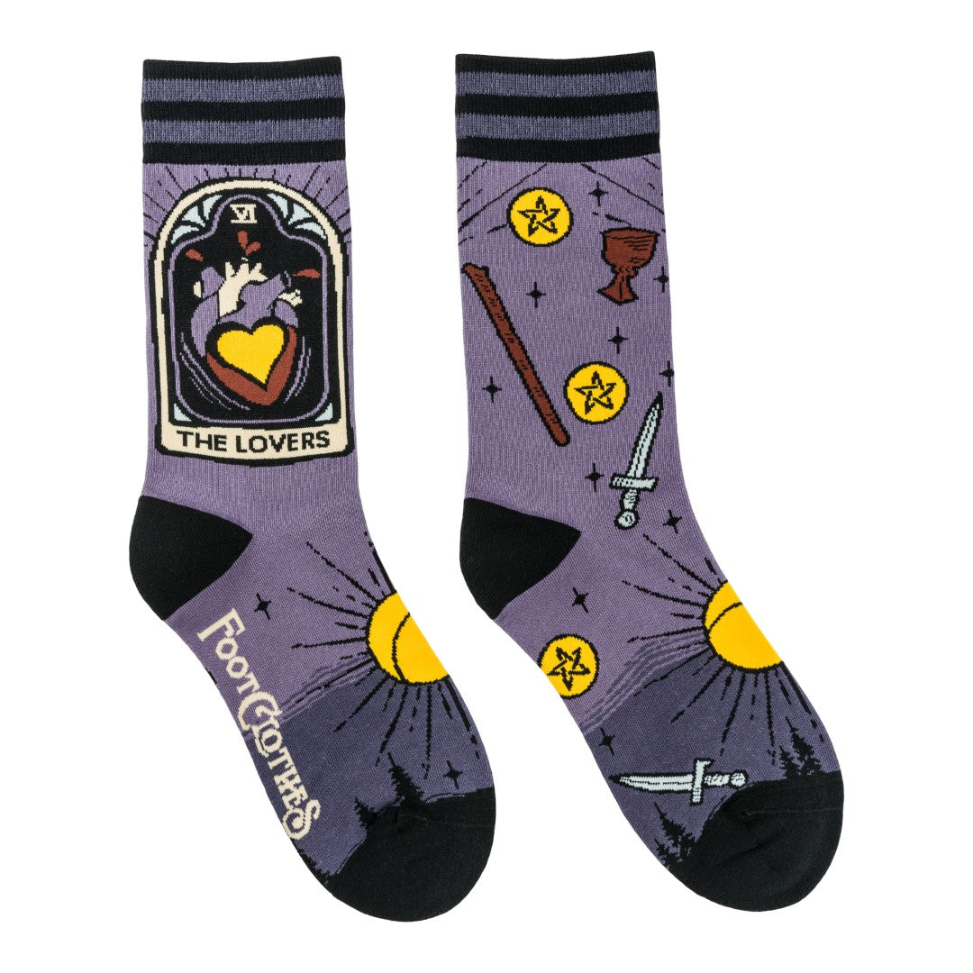 Purple socks with tarot card design and 'Footloose' branding on a white background