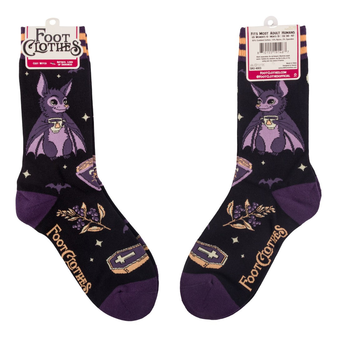 Pair of socks with a bat design and 'Foot Clothes' branding on a white background