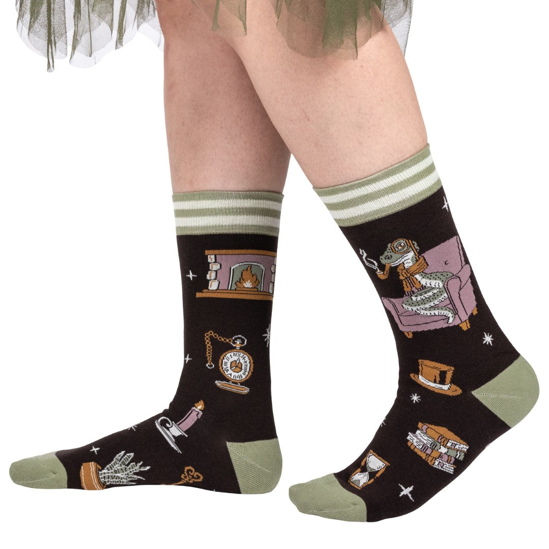 Socks with vintage-themed illustrations on a white background