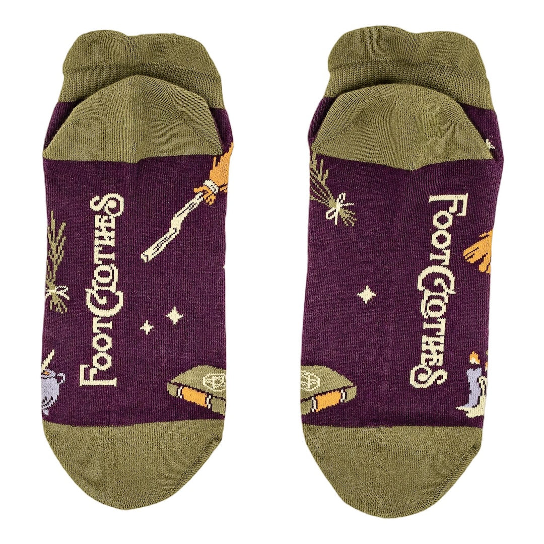 Pair of socks with Harry Potter-themed designs on a white background