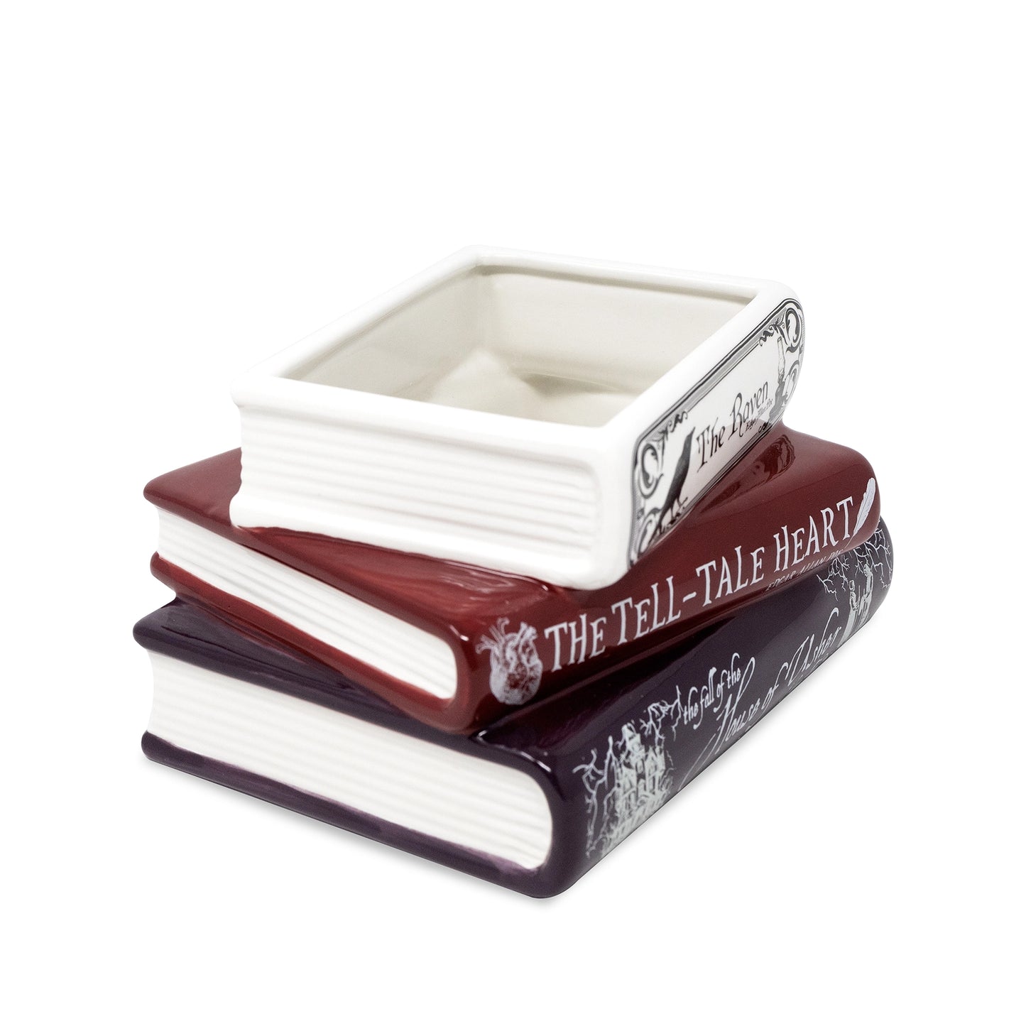 A plan holder designed to resemble a stack of books including 'The Tell-Tale Heart' on a white background