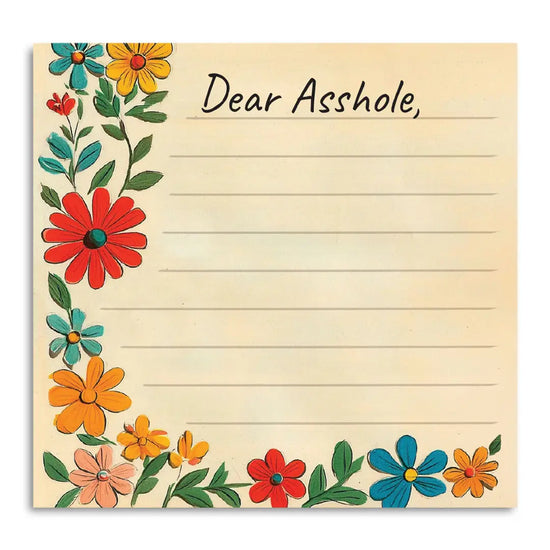 A yellow sticky note with horizontal lines. At the top is black text saying "Dear asshole." At the left and bottom are brightly colored flowers.