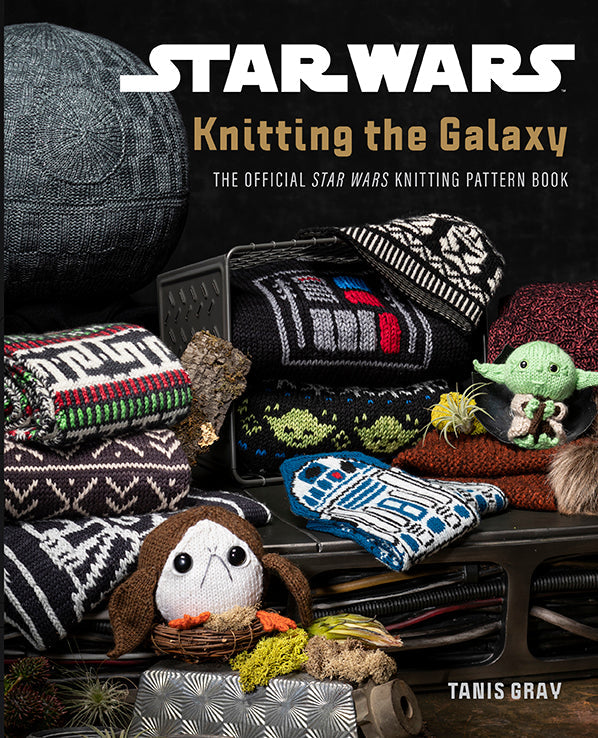 Book cover of 'Star Wars: Knitting the Galaxy' with knitted items and plush toys on a dark background.