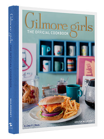 Cookbook titled 'Gilmore Girls: The Official Cookbook' with a burger and fries on the cover.