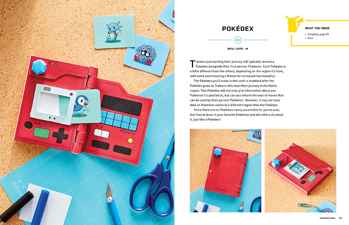 Pokédex craft kit with scissors and materials on a wooden surface
