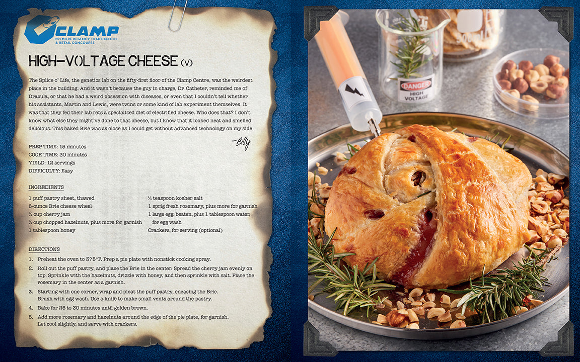 Baked dish with a knife on a plate next to a recipe card with 'CLAMP' branding.