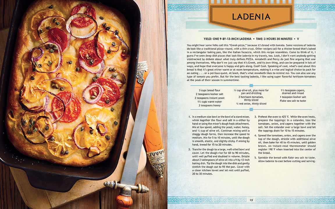 Baked dish with tomatoes and onions in a pan next to a recipe book page titled 'Ladenia'.