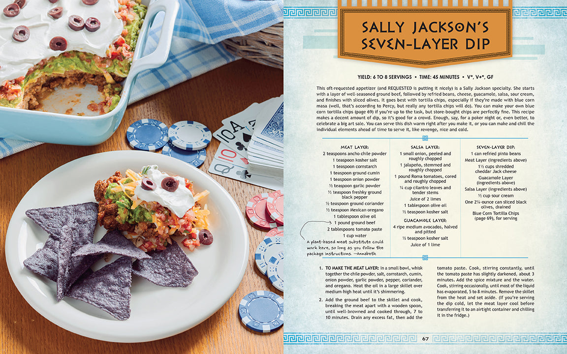 Seven-layer dip with tortilla chips on a plate, recipe card on the side
