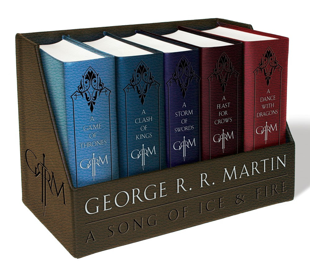 Close up of a boxed set of George R. R. Martin's "A Song Of Ice & Fire" book series, on a white background.