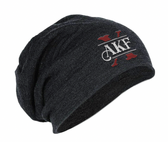 A black slouch beanie on a white background. The front of the beanie has a large red X, underneath the letters AKF in white.