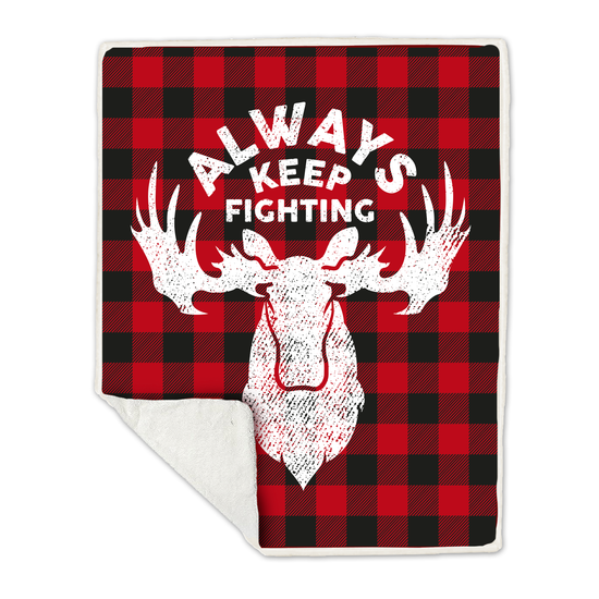 A red and black plaid blanket with a white border, against a white background. On the front of the blanket is a depiction of a moose head in white, with white text saying "Always Keep Fighting."