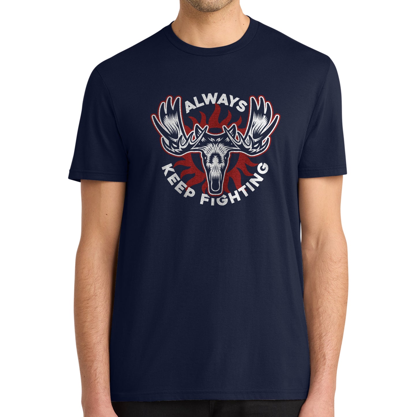 A model wearing a navy blue tee shirt. On the front is a depiction of a moose head, with "always keep fighting" in white text.