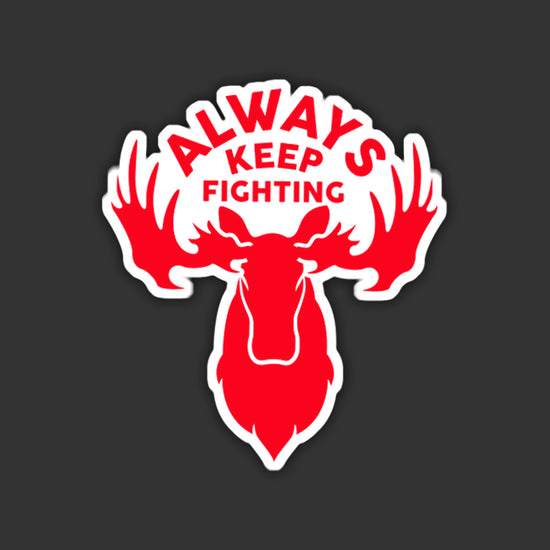 A window sticker depicting a red moose head with text saying "Always Keep Fighting"