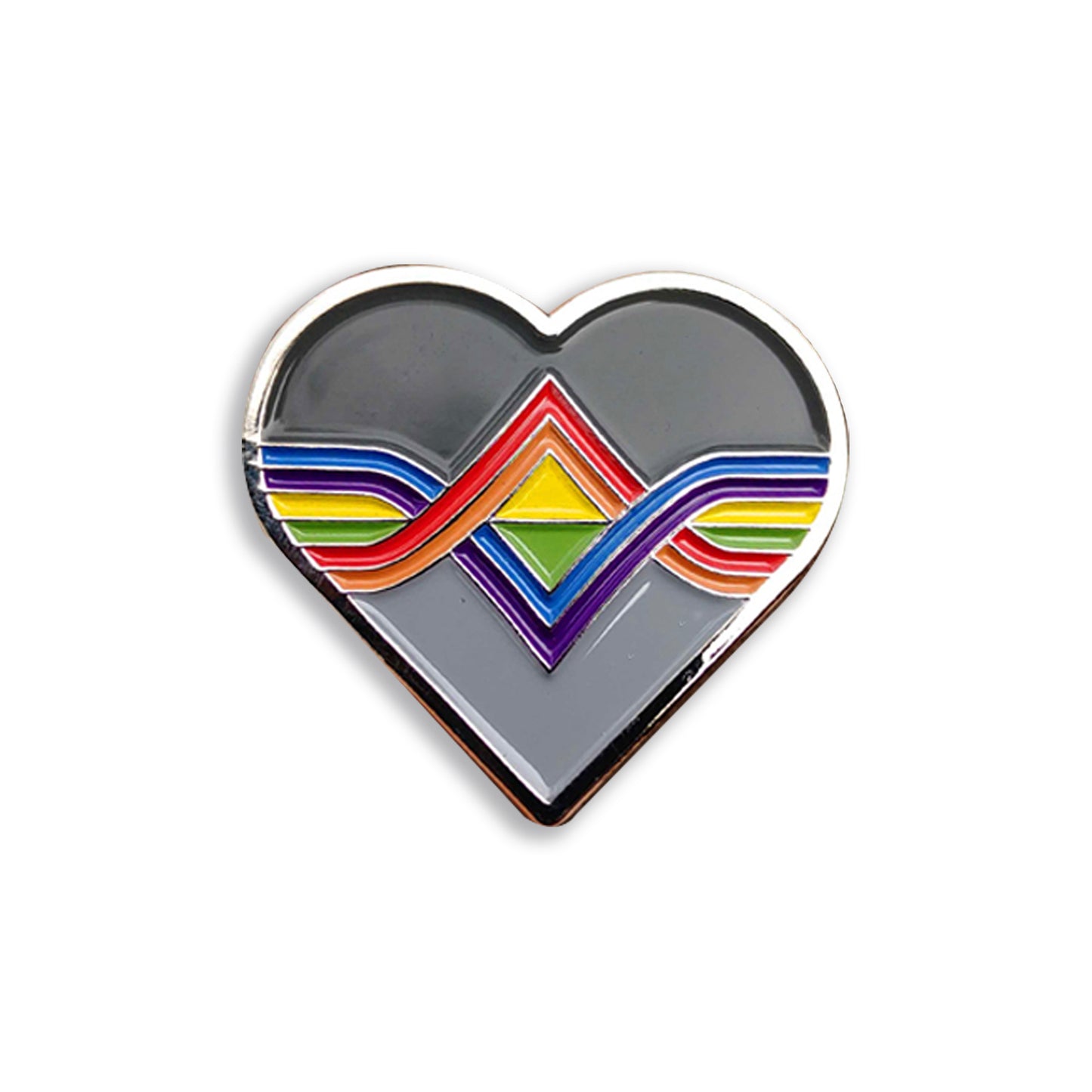 A brass pin of the Acting Ensign Pride symbol. The symbol is a grey heart with rainbow lines running through the center.