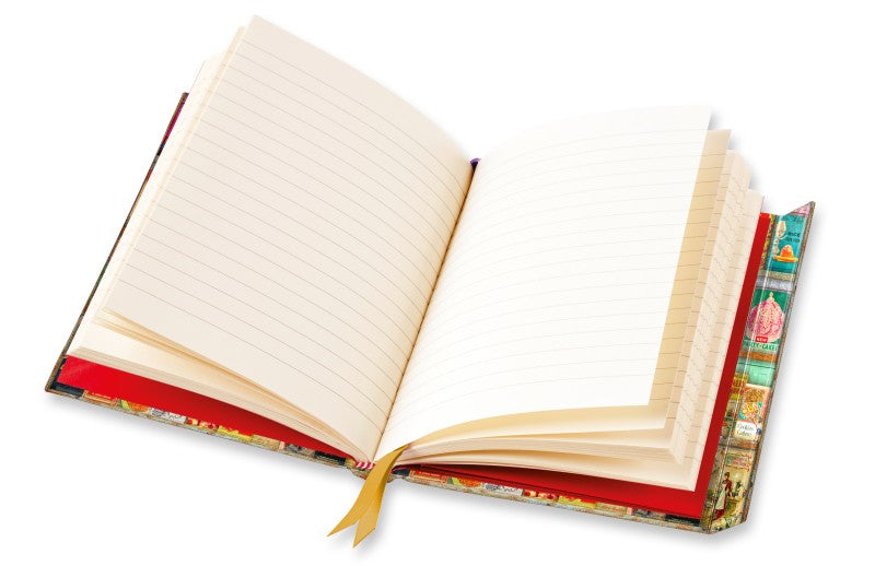 An image of the journal opened to show the blank lined pages inside.