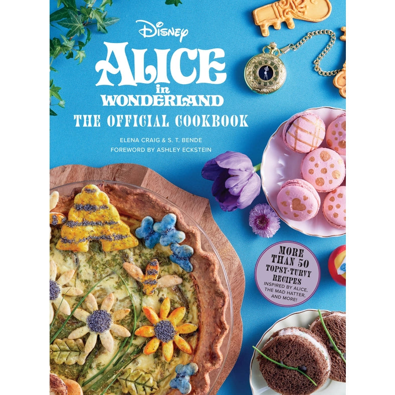A blue book on a white background. On the cover is white text saying "Alice in wonderland, the official cookbook." Various cakes and cookies are shown on the cover, next to flowers and a pocketwatch.