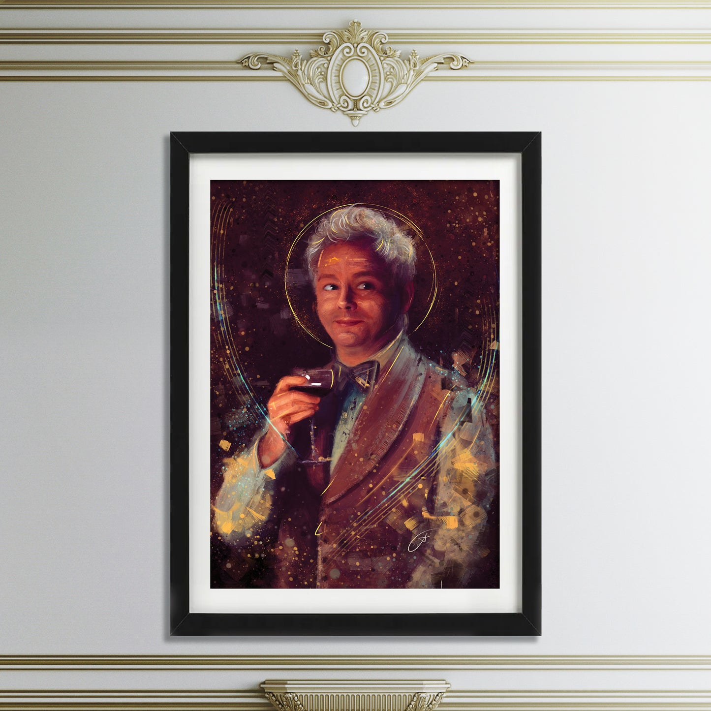 A black-framed picture on a white wall. The picture depicts the character Aziraphale from the TV series "Good Omens," wearing a white suit and holding a glass of red wine and surrounded by white and gold swirls. Above and below the framed picture is ornate crown moulding.