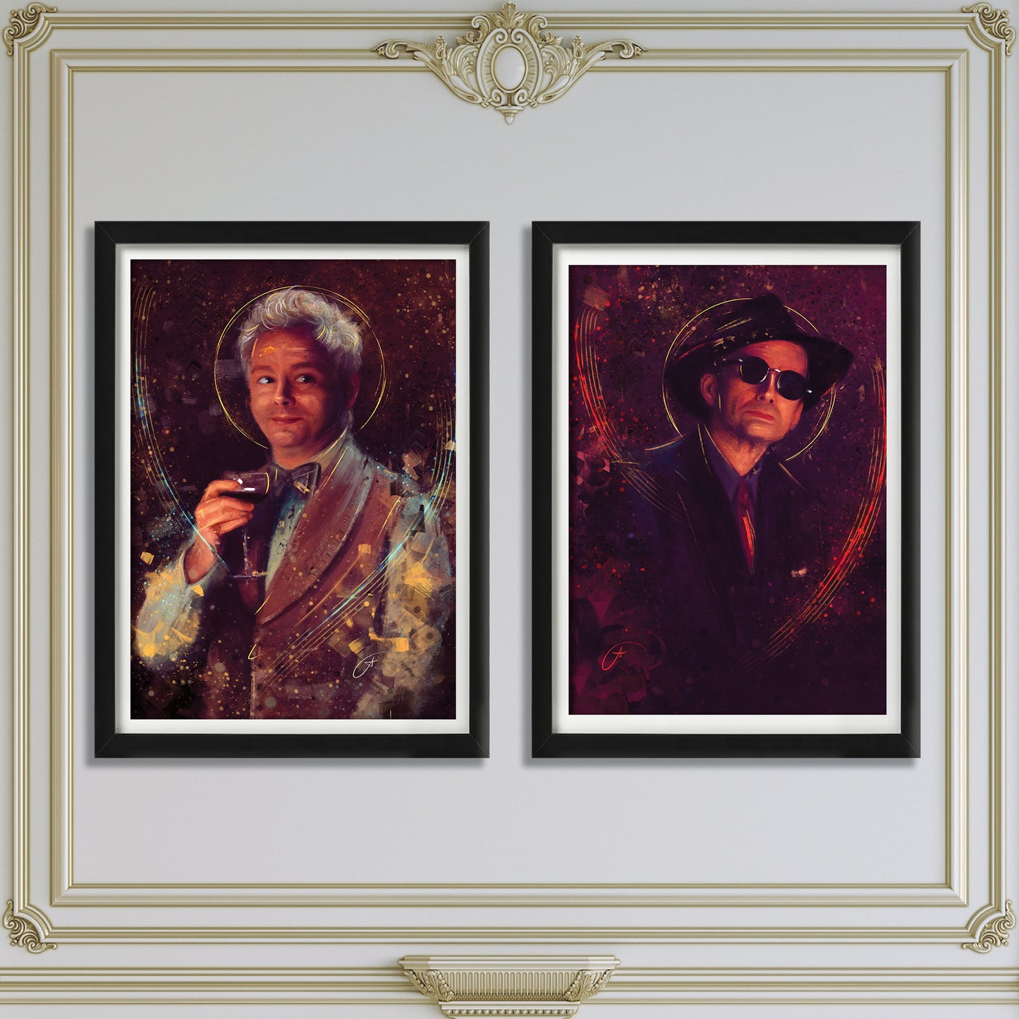 Two black-framed pictures hanging side by side on a white wall, with ornate crown moulding above and below. The  left picture depicts the character Aziraphale, and the right picture depicts Crowley, both from the TV series "Good Omens."