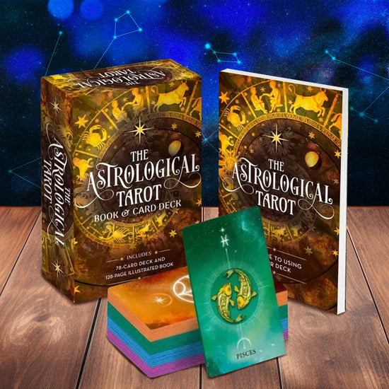 A brown and gold box depicting the 12 Zodiac signs in a spiral, against a white background. Across the middle is white text saying "the astrological tarot book and card deck." Next to the box is a guidebook with the same image and text as the box cover. In front of the box and guidebook are tarot card with astrological figures, in red, blue, green, and orange. The box is set against a blue night sky with constellations and rests on a wooden table.