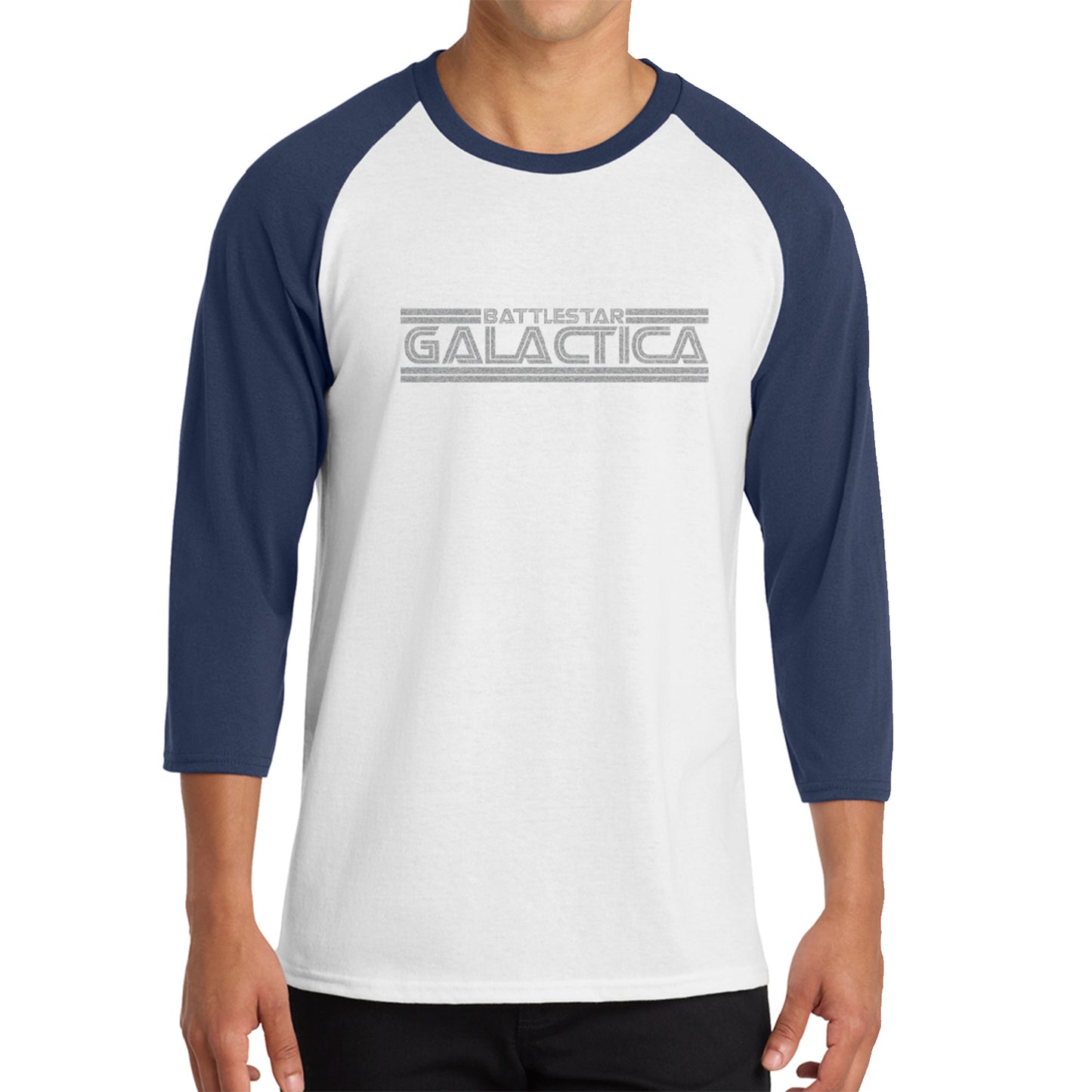 Person wearing a white and navy blue baseball shirt with 'Battlestar Galactica' logo.