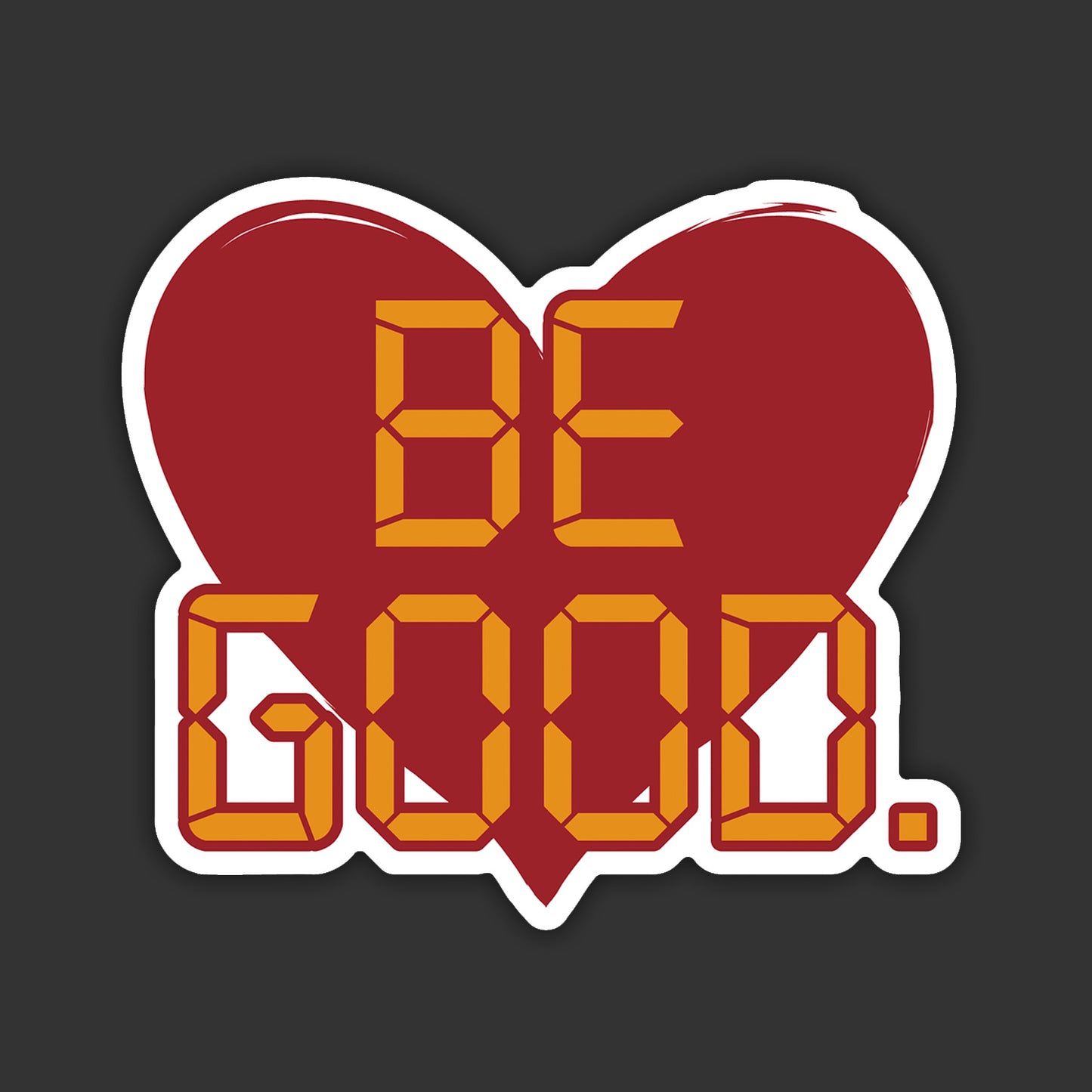 Heart-shaped sticker with 'BE GOOD.' text on a dark background