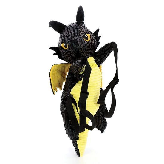 A black and yellow backpack against a white background. The backpack is shaped like a dragon with black straps. The dragon's eyes, belly, and wings are yellow.