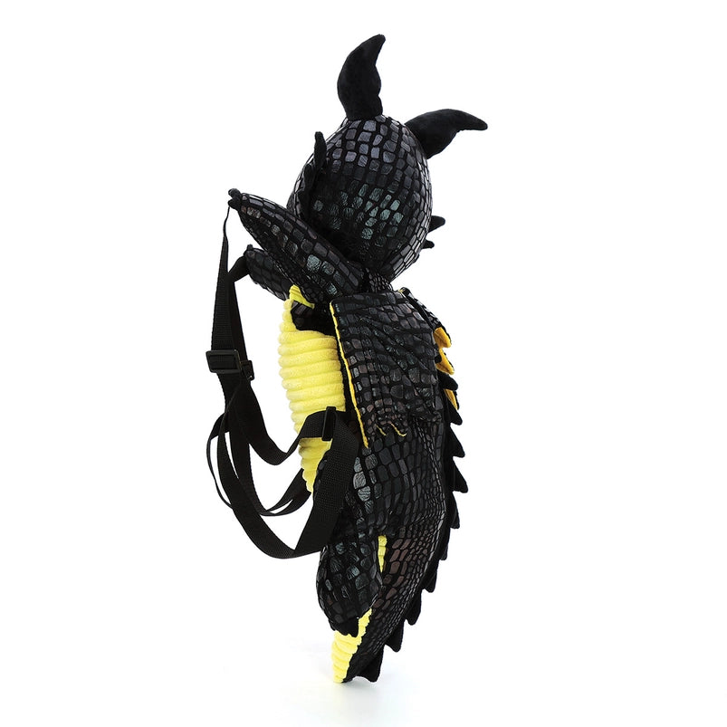 A black and yellow backpack against a white background. The backpack is shaped like a dragon with black straps. The dragon's eyes, belly, and wings are yellow.