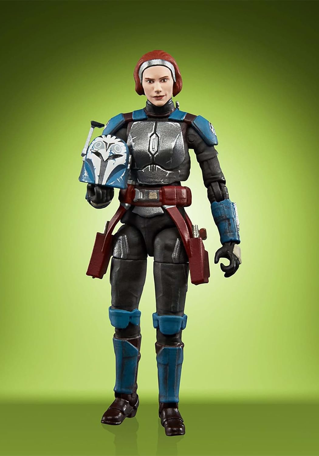 A plastic action figure depicting the character Bo-Katan Kryze from The Mandalorian, against a green background.