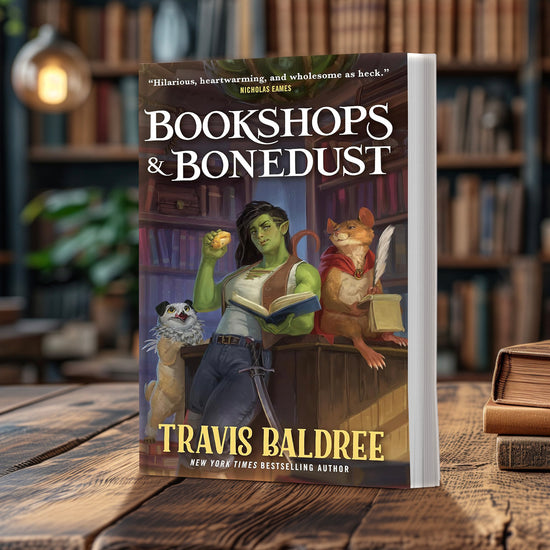 Load image into Gallery viewer, A book standing on a wooden table. The cover depicts a green skinned female character in jeans and a white tank top. She is leaning against a desk, holding a book in one hand. Next to her are a dog and a large mouse, and behind her are shelves filled with books. 
