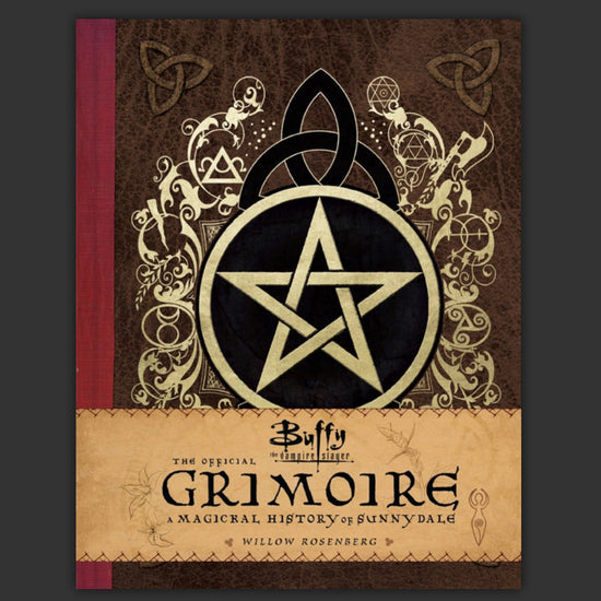 A hardcover book with a gold and black pentagram on the front cover. A brown band across the bottom says "Buffy the Vampire Slayer: The Official Grimoire."