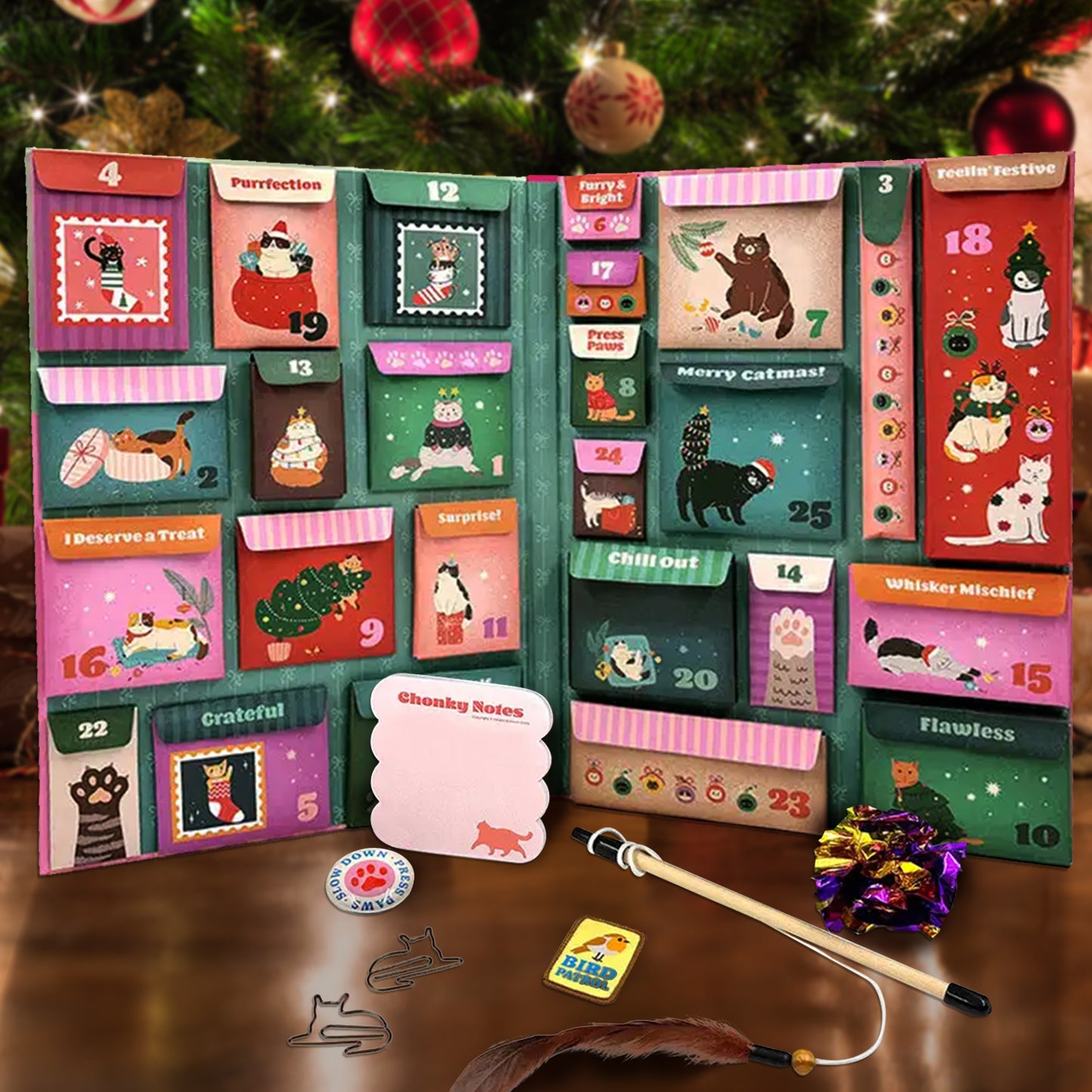 Pet-themed advent calendar with small toys and accessories on a wooden surface.