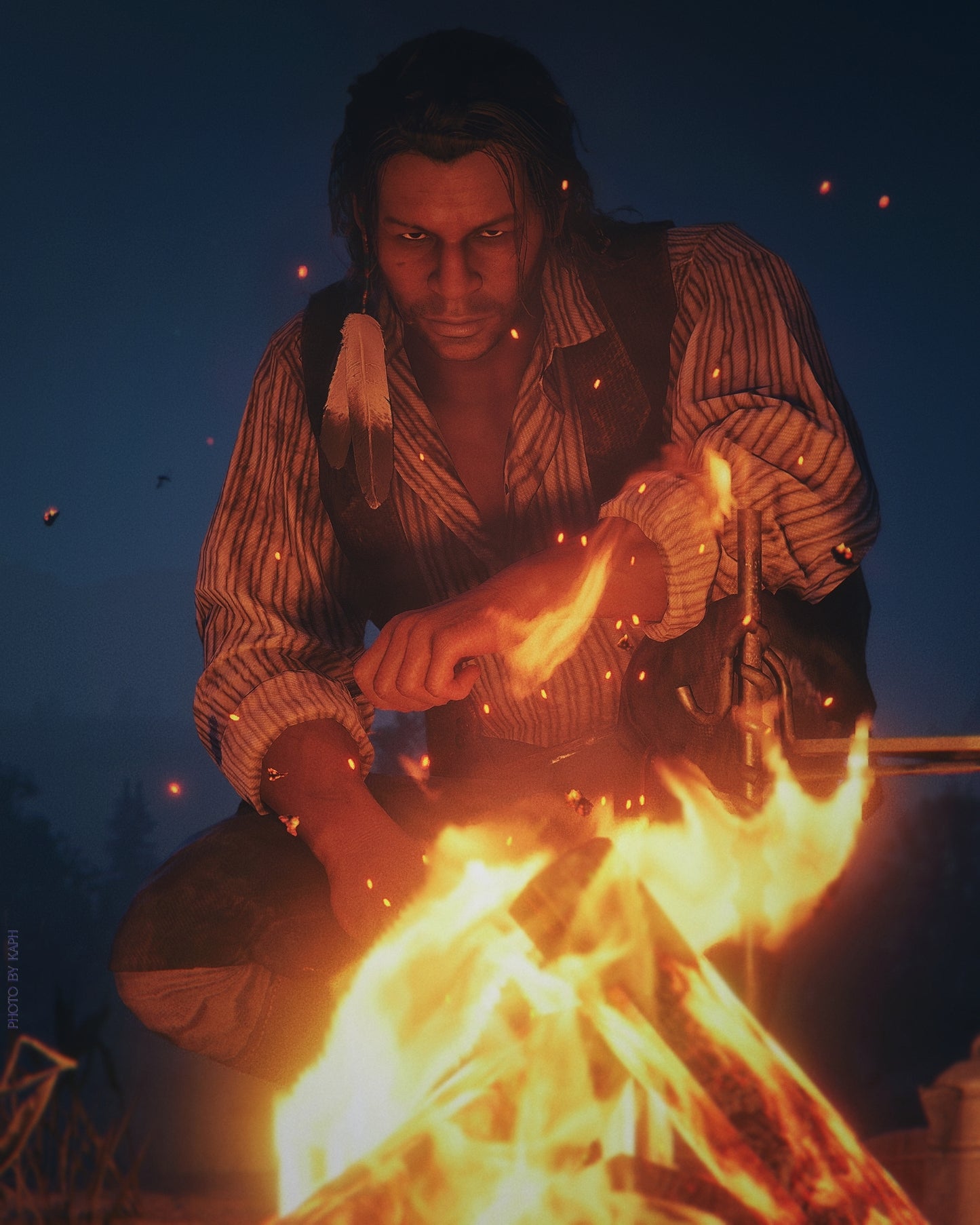 Person sitting by a campfire at night, holding a lit torch.
