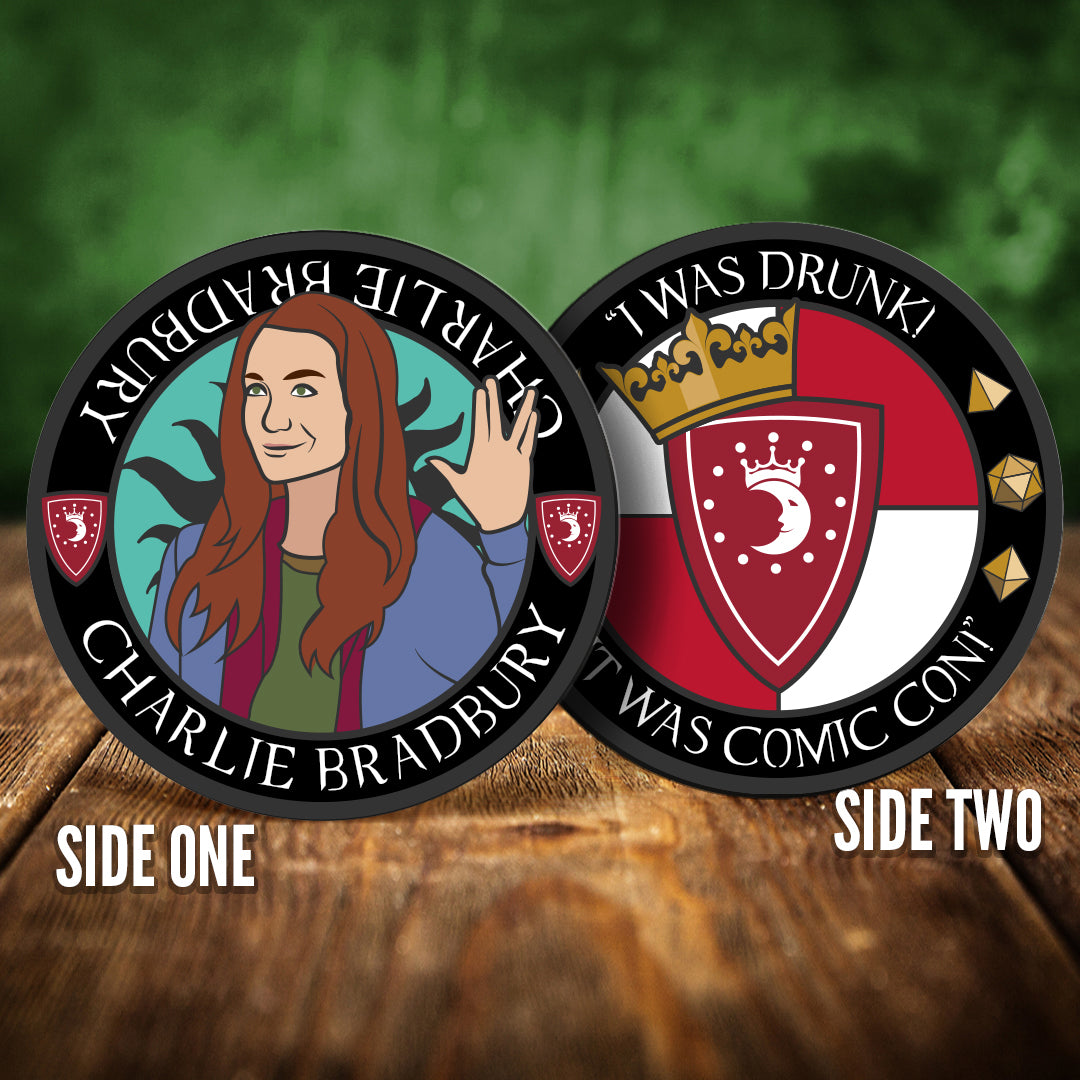 Two coins with different designs on a wooden surface and green background