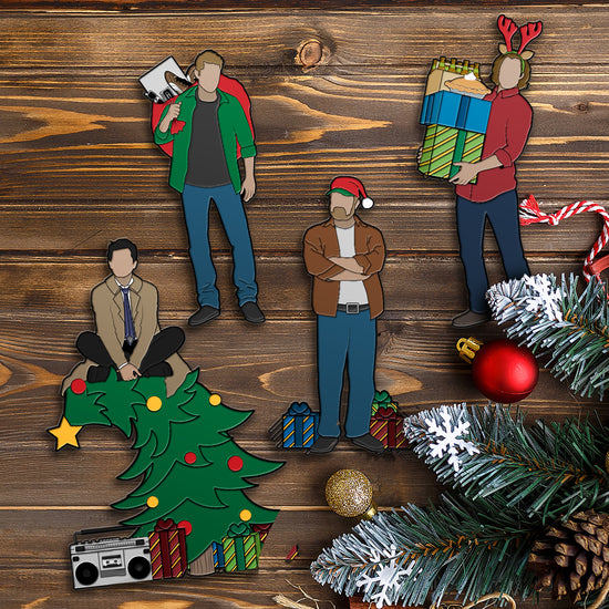 Decorative SPN figures on a wooden surface with ornaments.