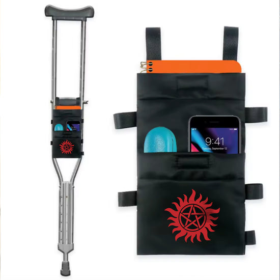 Side by side images of a metal crutch with a black nylon pouch attached to the handle bar, next to a larger image of the pouch. The pouch has the anti-possession symbol at the bottom in red. Inserted into the pocuh's pockets are a cell phone, an orange notepad, and a blue eyeglass case.