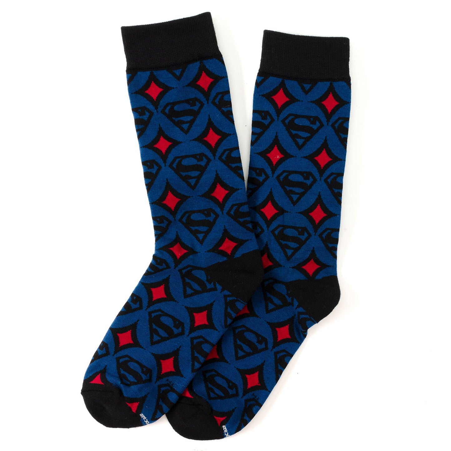 Superman-themed socks with blue, red, and black pattern on a white background