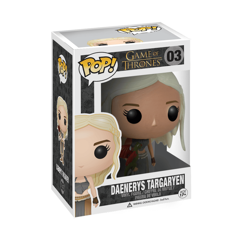 A cardboard box with a transparent front, containing a bobblehead figure depicting Daenerys Targaryen in a green outfit, with a red dragon curled on her hand.