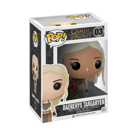 A cardboard box with a transparent front, containing a bobblehead figure depicting Daenerys Targaryen in a green outfit, with a red dragon curled on her hand.