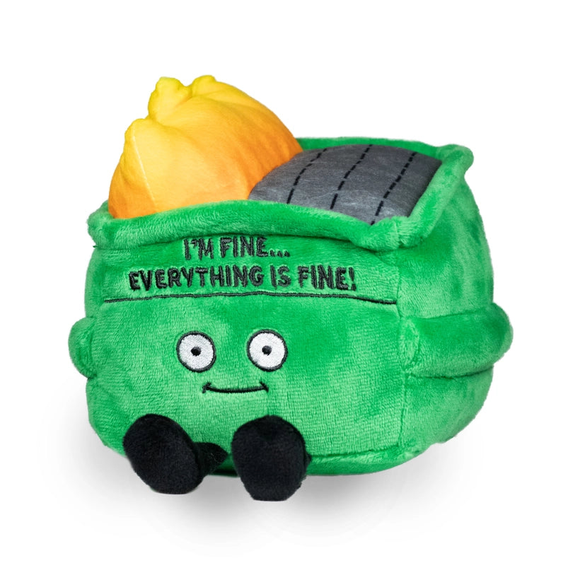 A green, square plushie depicting a dumpster on fire. The plushie has large white eyes and small black legs. Black text at the top says "I'm fine. Everything is fine!"