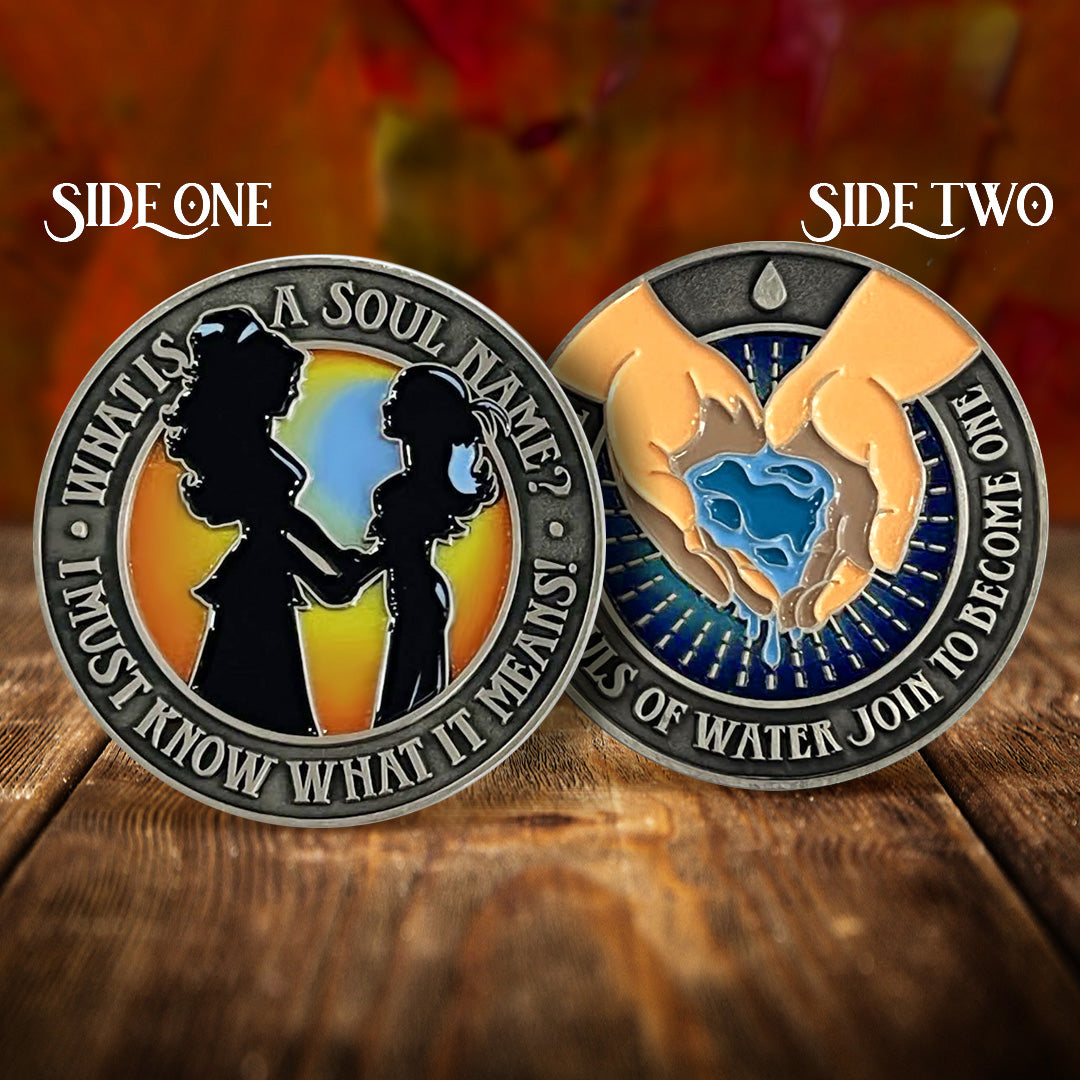 A front and back image of a brass challenge coin, on a wood table. On the front is a drawing of two Elfquest characters in silhouette. Raised text around the edge says "What is a soul name?I must know what it means!." The back of the coin depicts a two hands cradling blue water. Behind the coin is a swirling red and brown background.