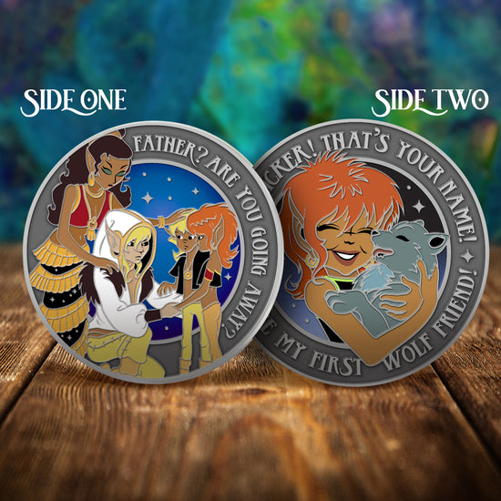 Two challenge coins side by side on a wooden table, with a swirling green and blue pattern in the background. The left coin depicts the ElfQuest characters Leetah, Cutter, Suntop, and Ember, looking together. Text around the edge of the coin says "Father? Are you going away?" The right coin depicts a human with orange hair holding a gray wolf. Text around the edge says "Choplicker! That's your name! You're my first wolf friend."