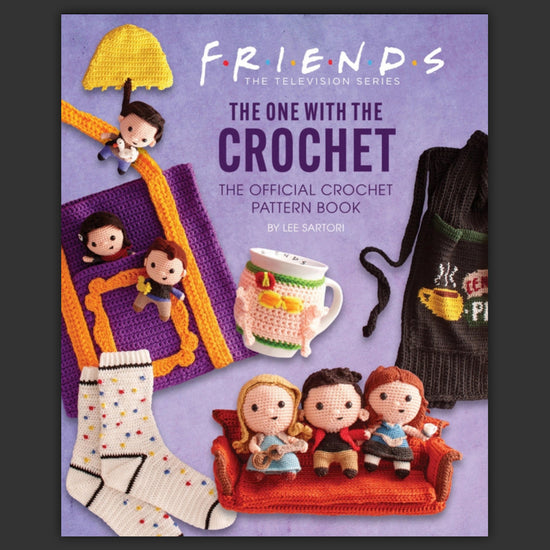 A purple hardcover book featuring crochet projects inspired by the TV series "Friends." Text at the top says "Friends, the one with the crochet."