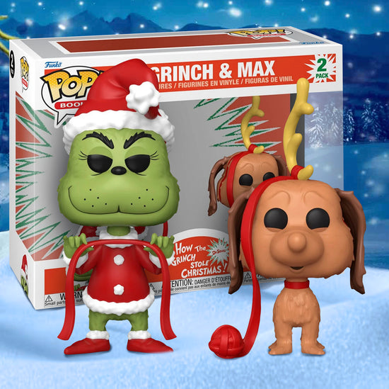A pair of bobblehead figures, depicting The Grinch and his dog Max. The Grinch is in his Santa suit, and Max has a reindeer antler on his head. In the background is a winter scene.